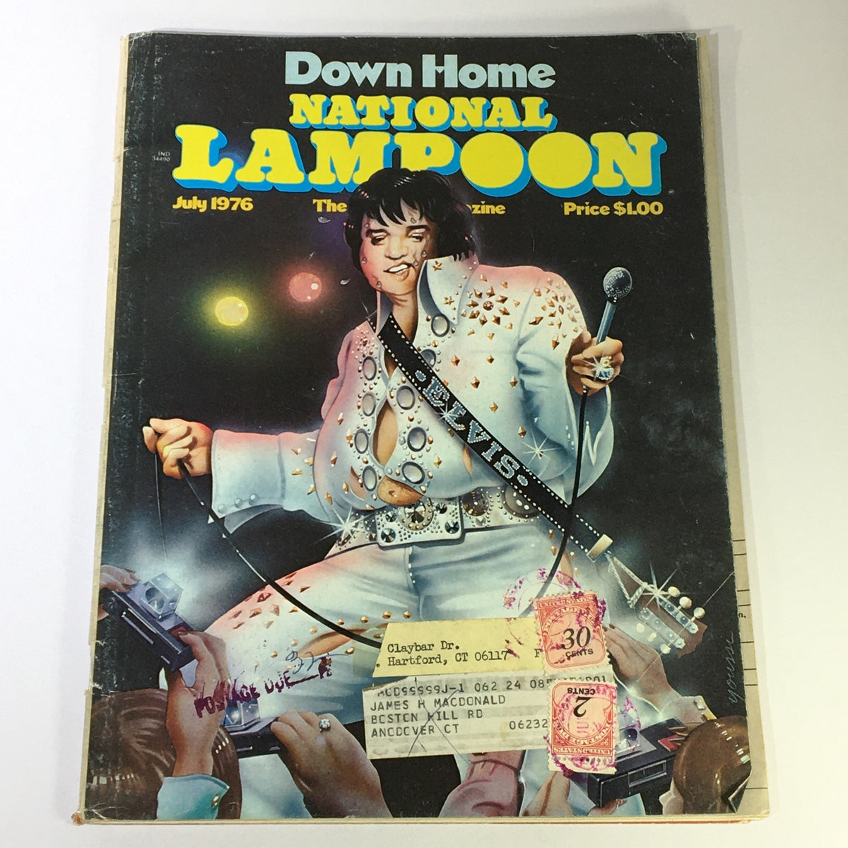Vintage July 1976 National Lampoon Magazine featuring Elvis Presley, showcasing a colorful cover art with the King of Rock and Roll in his iconic outfit.