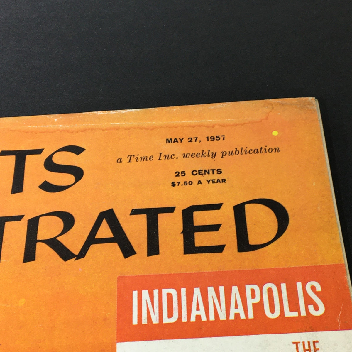 Close-up view of the May 27 1957 Sports Illustrated magazine cover showing details including publication date and price, featuring Jim Bryan.