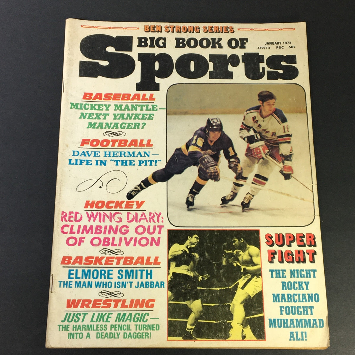 Cover of the VTG Big Book of Sports from January 1973 featuring Mickey Mantle and Dave Herman, highlighting various sports like baseball, football, hockey, and wrestling, with a vintage newsstand aesthetic.