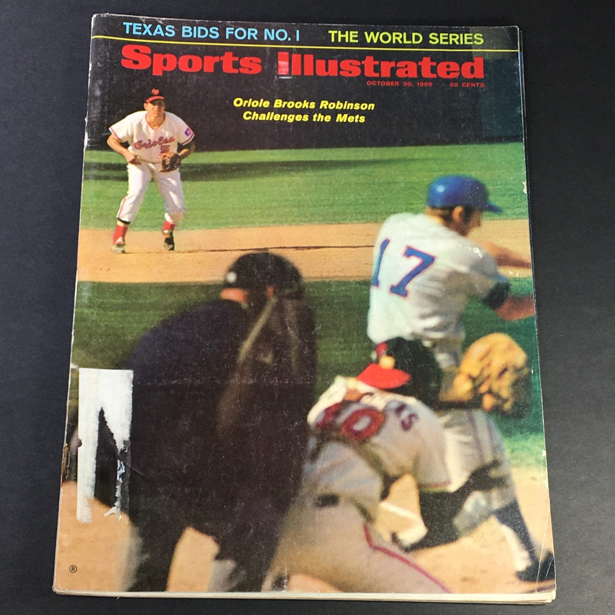 VTG Sport Illustrated Magazine featuring Brooks Robinson on the cover, dated October 20, 1969, showcasing a baseball scene with players in action.