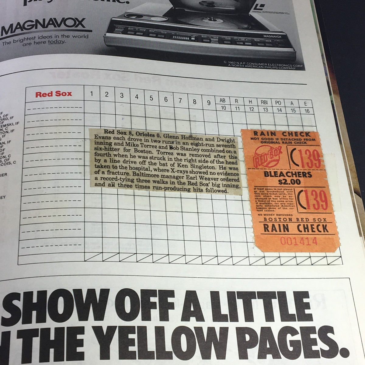 Interior page of the VTG MLB Official Scorebook Magazine for the Boston Red Sox, Third Edition 1982, showing scorekeeping details and an article summary with game highlights and a rain check ticket.