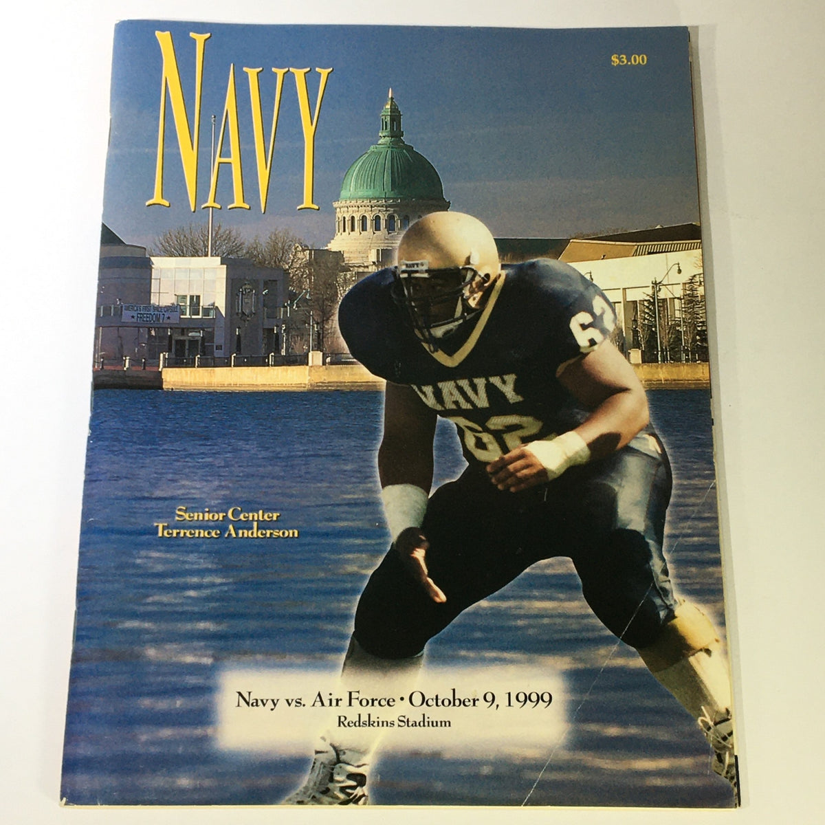 Cover of the magazine featuring Navy vs Air Force, showcasing Senior Center Terrence Anderson, dated October 9, 1999, at Redskins Stadium.