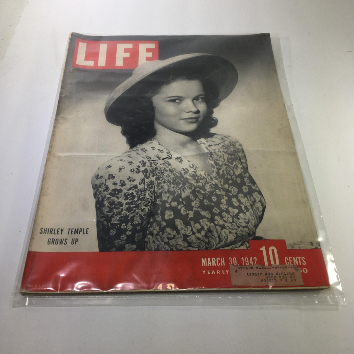 Cover of Life Magazine from March 30, 1942, featuring Shirley Temple with the title 'Shirley Temple Grows Up'. The magazine showcases historical Hollywood charm and vintage appeal.