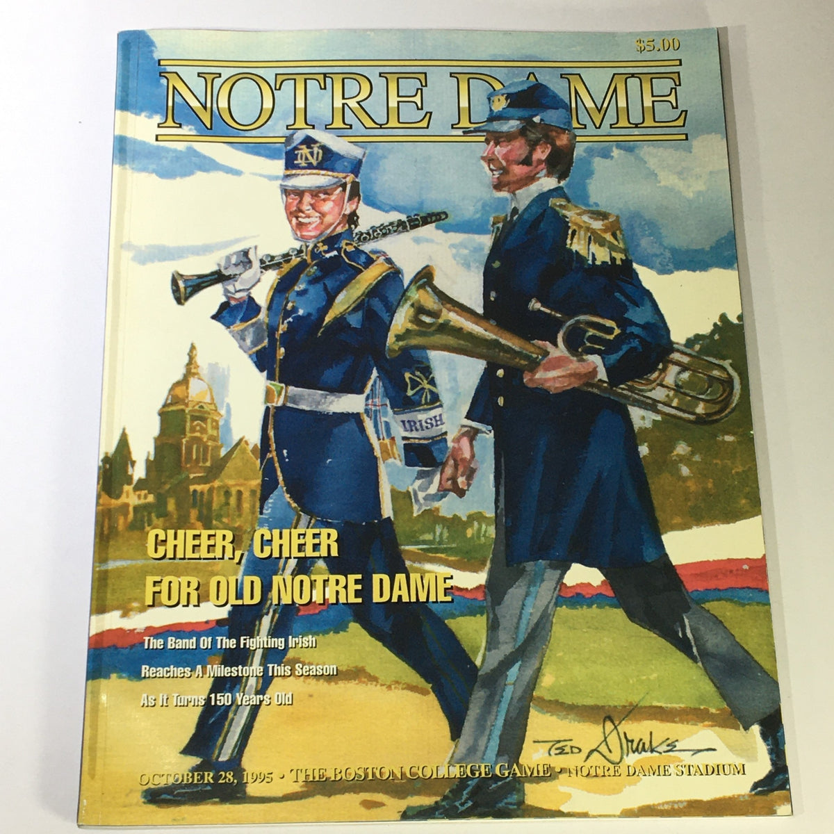 Cover of the magazine featuring Notre Dame Stadium during the Boston College game on October 28, 1995. It showcases band members in uniforms with musical instruments, celebrating tradition with the title 'Cheer, Cheer for Old Notre Dame'.