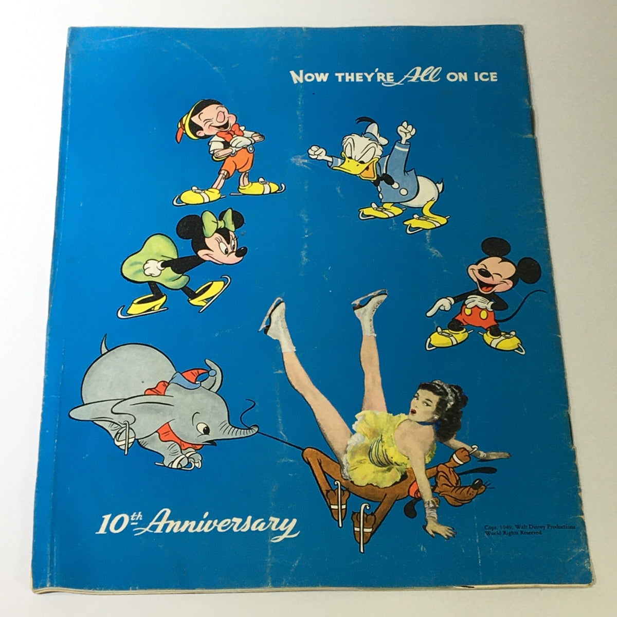 Cover of the VTG Ice Capades Brochure of 1950 A Walt Disney Production, celebrating the 10th anniversary with colorful Disney characters on ice, including Mickey Mouse and Dumbo.