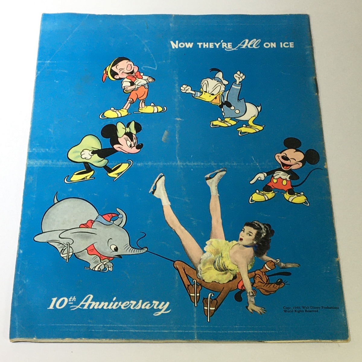 Cover of the VTG Ice Capades Brochure of 1950 displaying Disney characters including Mickey Mouse, Donald Duck, and Dumbo, celebrating the 10th Anniversary of Ice Capades.