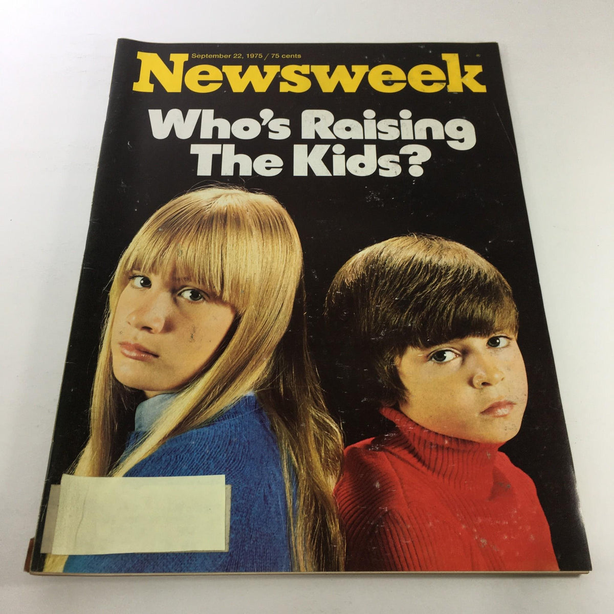 Cover of Newsweek Magazine from September 22, 1975, titled 'Who's Raising The Kids?', featuring two children, one with long blond hair in a blue sweater and the other in a red turtleneck, depicting themes of parenting and family dynamics.