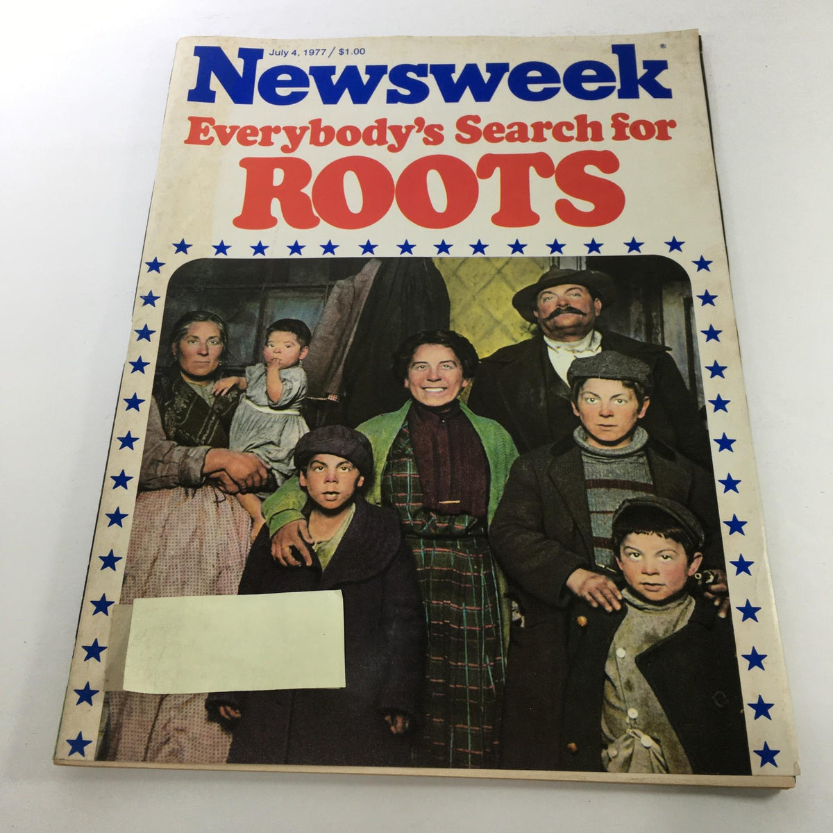 Cover of Newsweek Magazine: July 4, 1977, titled 'Everybody's Search for Roots', featuring a group of diverse people posed together, showcasing historical themes related to family and identity.