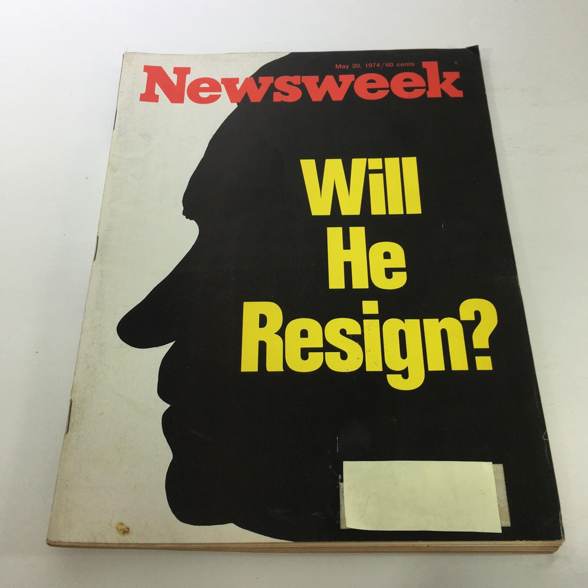 Cover of Newsweek Magazine dated May 20, 1974, featuring the title 'Will He Resign?' in bold yellow text against a black background, highlighting Richard Nixon's profile silhouette.