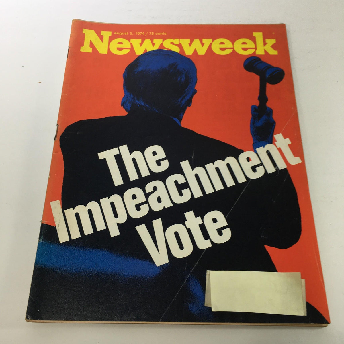 Cover of Newsweek Magazine dated August 5, 1974, featuring bold graphics and the title 'The Impeachment Vote', showcasing a silhouette of a politician holding a gavel against a vibrant red background, representing a significant moment in American history.