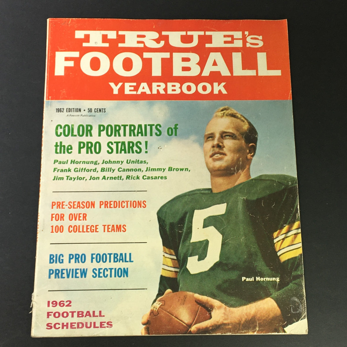 VTG True's Football Yearbook 1962 Edition featuring a vintage cover with Paul Hornung in a green football jersey holding a football, highlighting legendary players Johnny Unitas and others.