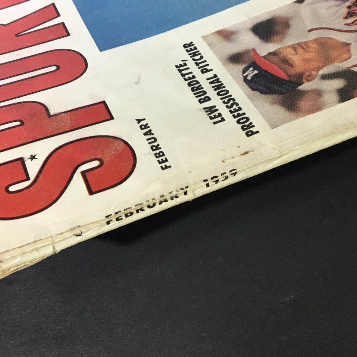 Side view of Sport Magazine February 1959, showcasing the publication date and the name of featured athlete Lew Burdette, professional pitcher.