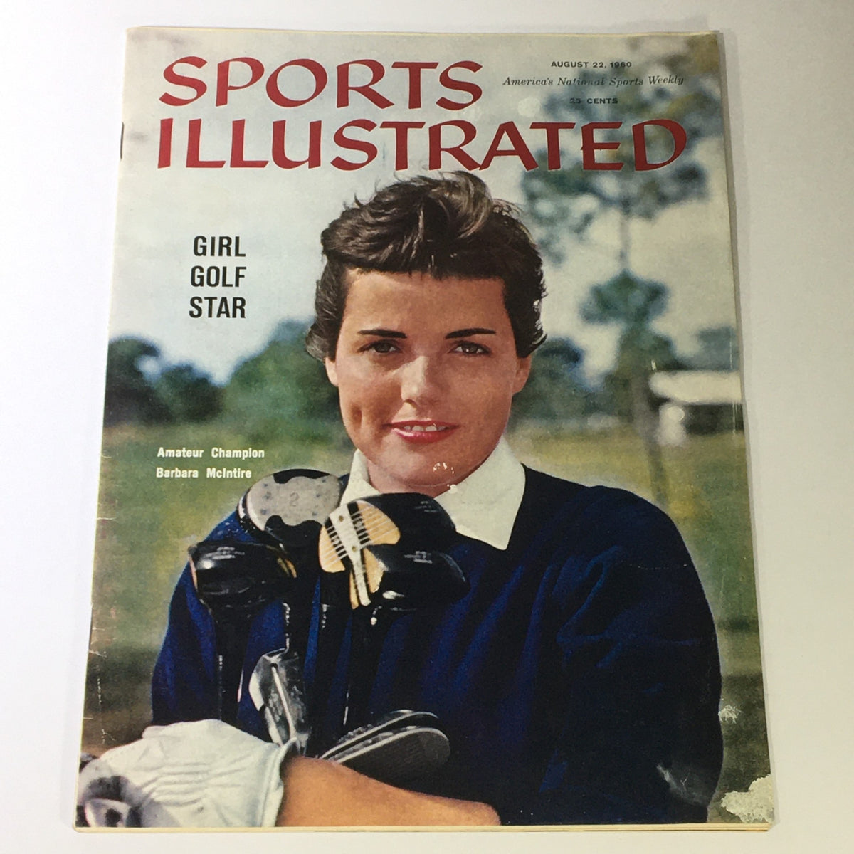 Sports Illustrated Magazine August 22 1960 featuring Barbara McIntire on the cover, showcasing a female golfer with clubs, capturing vintage sports culture.