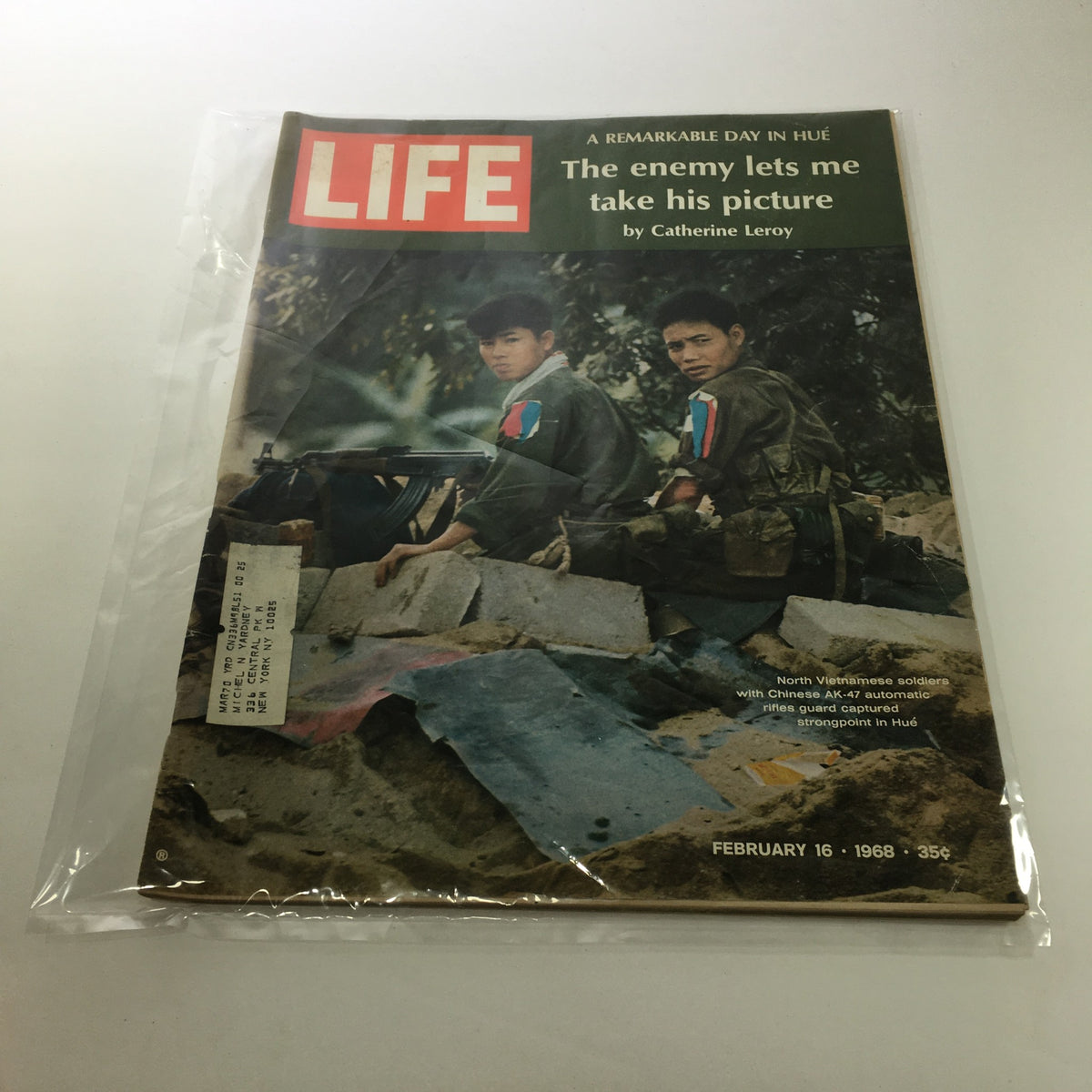 Cover of Life Magazine from February 16, 1968 featuring the photo essay 'The Enemy Lets Me Take His Picture' by Catherine Leroy, showcasing North Vietnamese soldiers with AK-47 rifles. This iconic issue reflects the historical context of the Vietnam War.