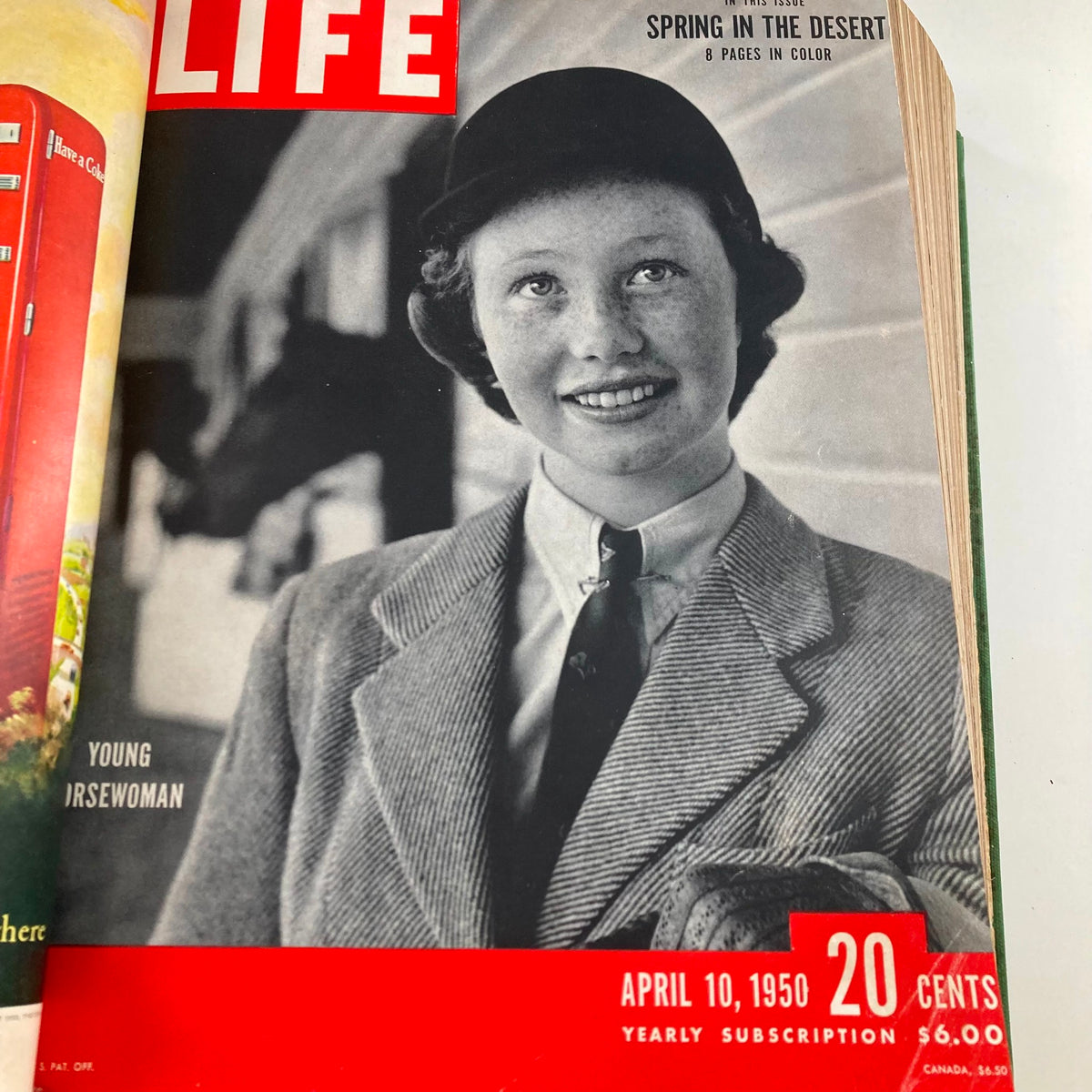 Vintage 1950 Bound Life Magazine April 10 issue featuring a young horsewoman smiling at the camera, showcasing classic fashion from the early 1950s.