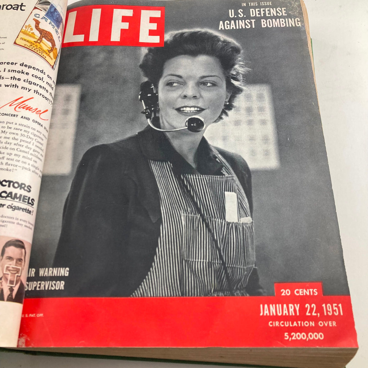 Cover of the VTG 1951 Bound Life Magazine featuring a woman with a headset on January 22, 1951, focusing on U.S. defense against bombing.