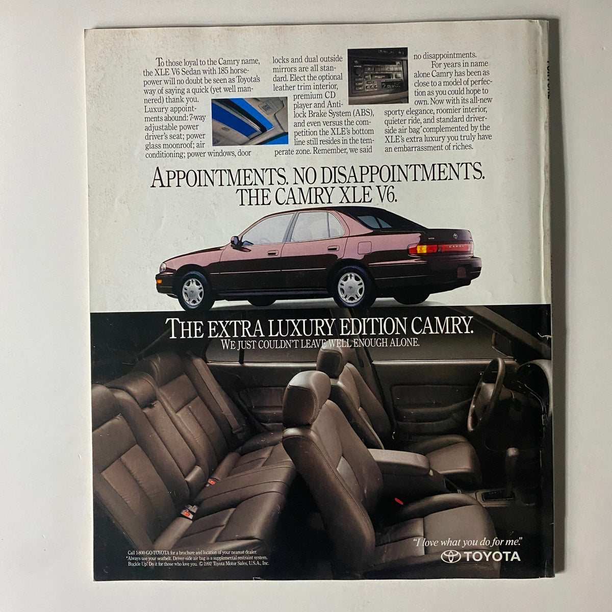 Back cover advertisement of the Toyota Camry XLE V6 from Fortune Magazine June 29, 1992, showcasing its luxury features and design, appealing to automotive enthusiasts.
