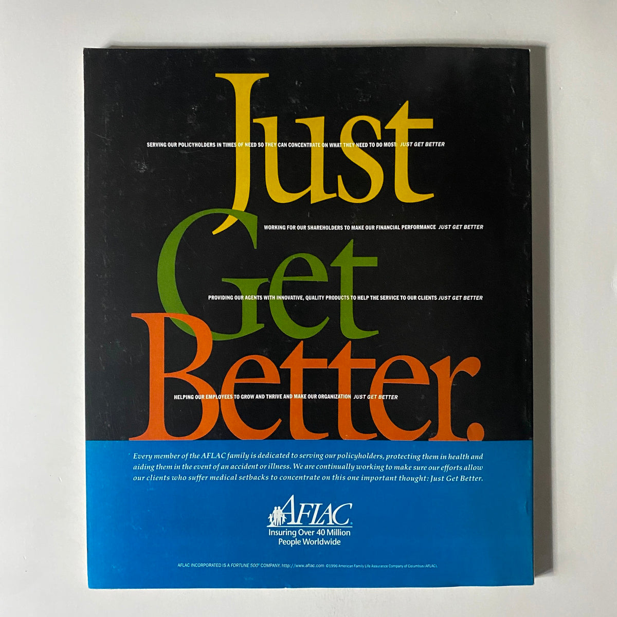 Back cover of Fortune Magazine, August 19, 1996, featuring a promotional message from AFLAC with bold text urging to 'Just Get Better', reflecting commitment to enhancing financial performance.