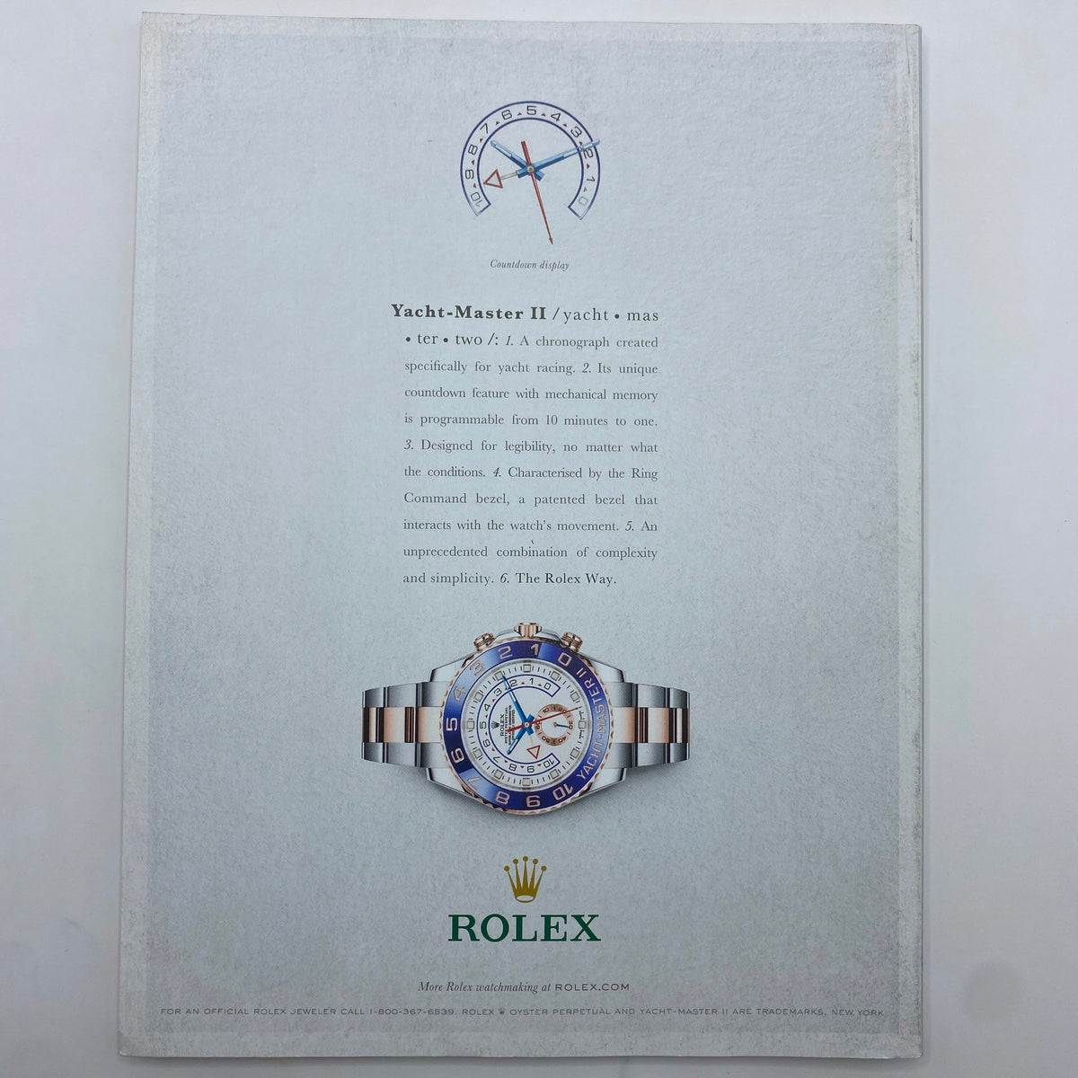 Fortune Magazine December 1, 2014 includes an advertisement for Rolex Yacht-Master II watch, highlighting its features and association with luxury and precision.