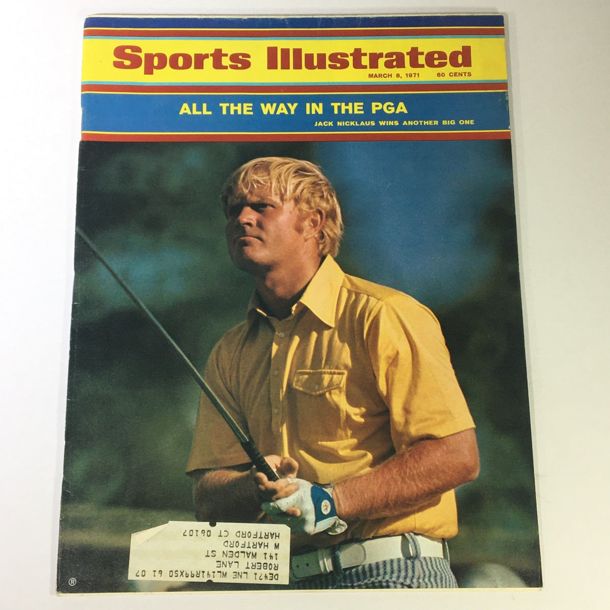 Vintage Sports Illustrated Magazine cover from March 8, 1971, featuring professional golfer Jack Nicklaus. The cover highlights Nicklaus in a yellow shirt, showcasing his dynamic presence in professional golf, alongside the title ‘All the Way in the PGA’ and the magazine branding.