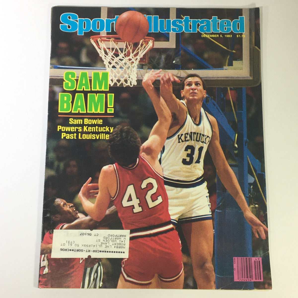 VTG Sports Illustrated Magazine from December 5, 1983 featuring Kentucky's Sam Bowie, showcasing him in a dynamic basketball pose while shooting. The cover highlights the text 'SAM BAM!' and presents a colorful scene from a game against Louisville.