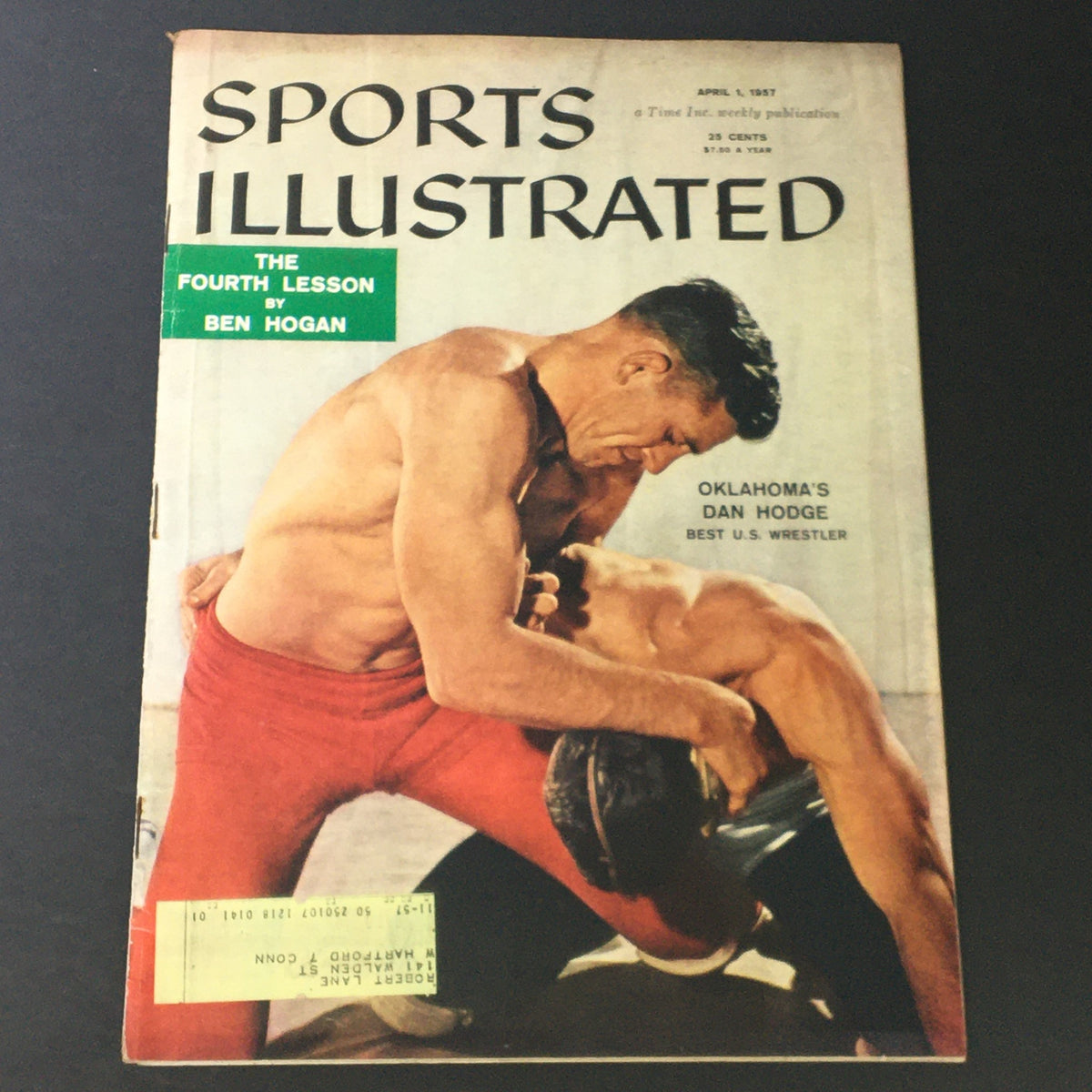 Vintage Sports Illustrated Magazine from April 1, 1957, featuring U.S. wrestler Oklahoma's Dan Hodge on the cover, showcasing wrestling culture of the 1950s.