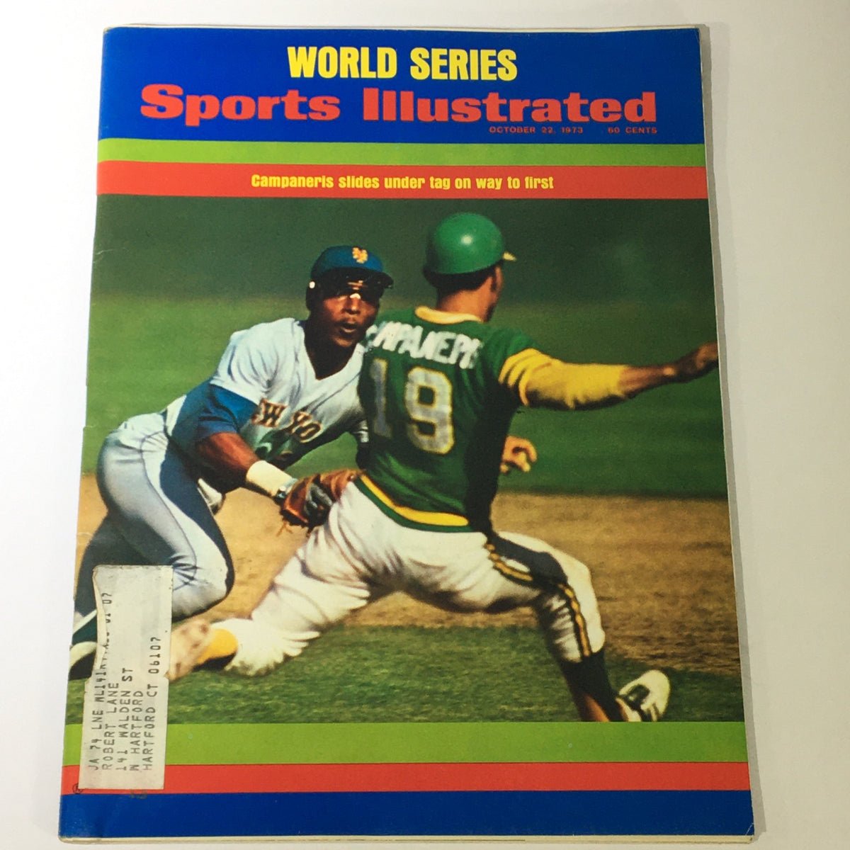 Vintage Sports Illustrated Magazine from October 22, 1973, featuring Bert Campaneris of the Oakland Athletics sliding into first base during a pivotal play in the World Series.