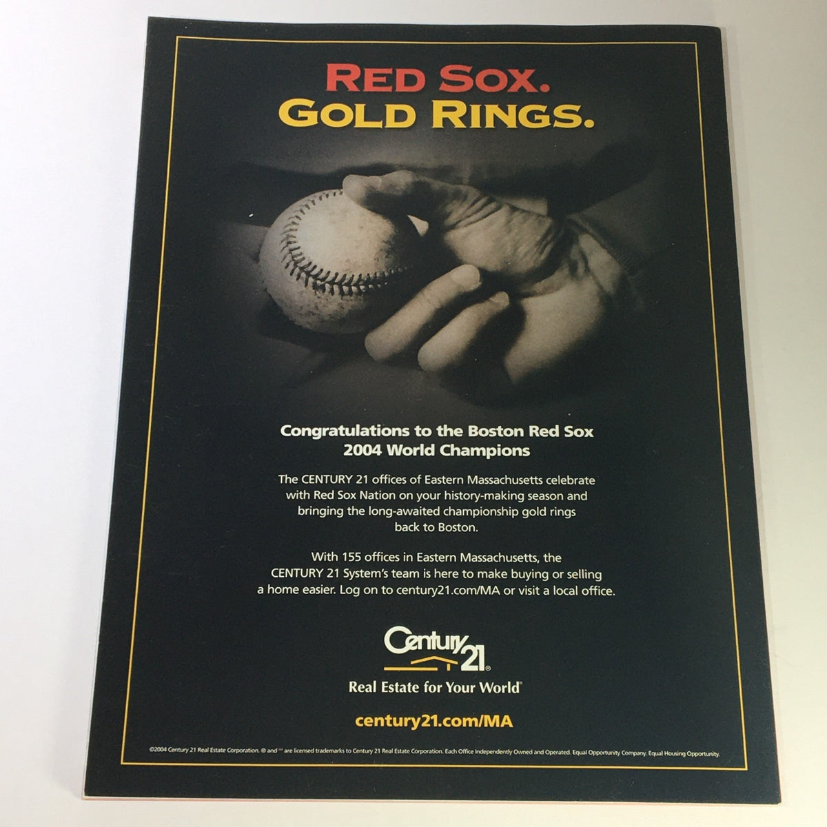 Back cover of Street & Smith's Presents 2004 World Champion Boston Red Sox showcasing a baseball and congratulatory message.
