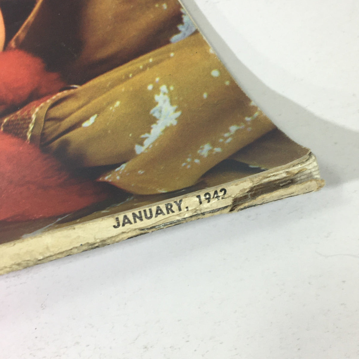 Bottom edge detail of Popular Photography Magazine January 1942 Vol X #1 highlighting the publication date, 'JANUARY, 1942'.