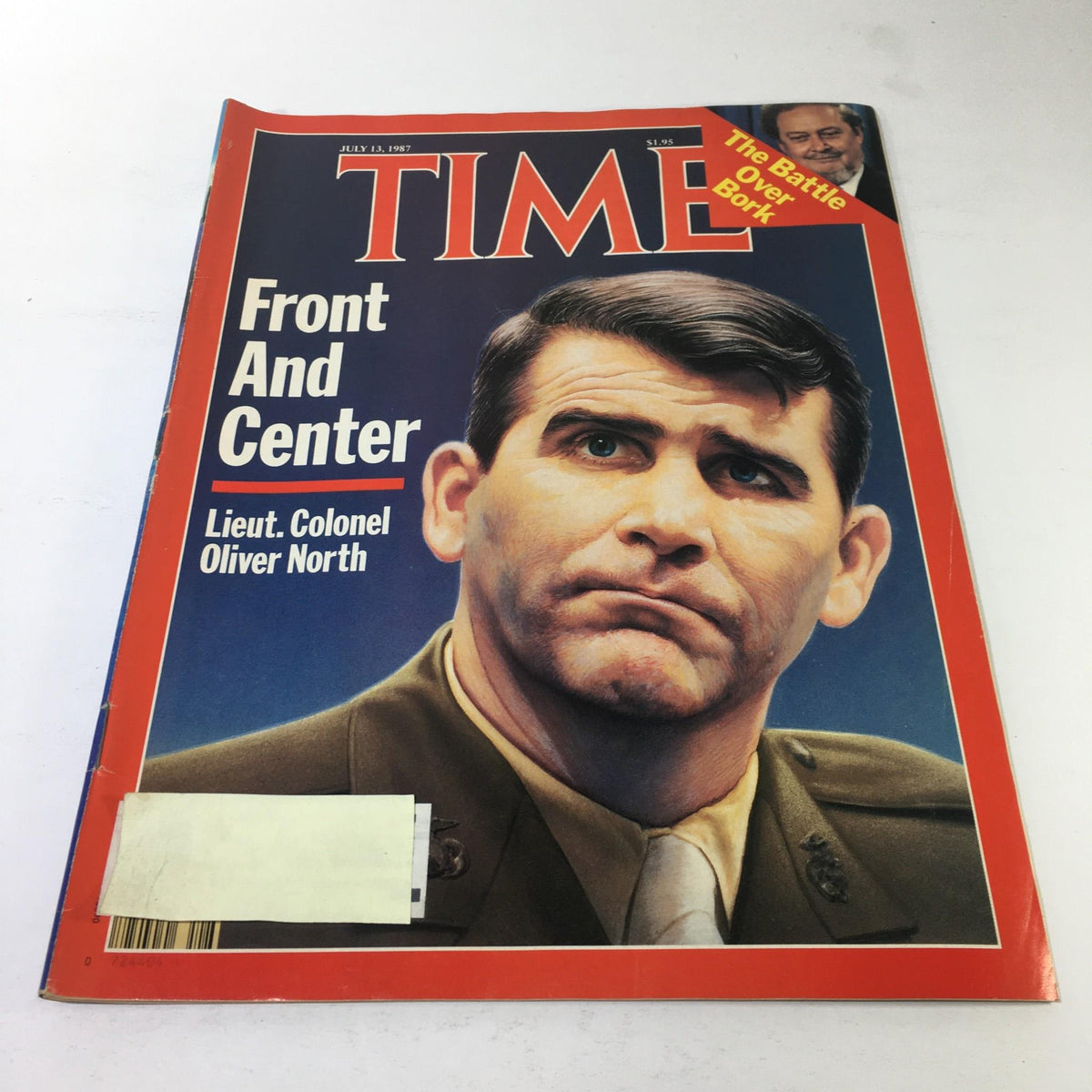 Time Magazine cover from July 13, 1987, featuring Lieut. Colonel Oliver North with the title 'Front And Center'. This vintage magazine showcases a significant historical moment and is a valuable item for collectors and history enthusiasts.