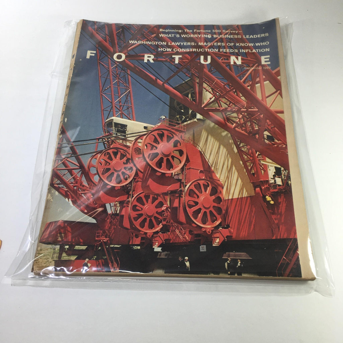 Cover of Fortune Magazine: September 1969 featuring a striking image of a red construction crane, highlighting the article 'Washington Lawyers: Masters of Know-Who'. This collectible vintage magazine showcases insights into the legal elite of Washington during the 1960s.