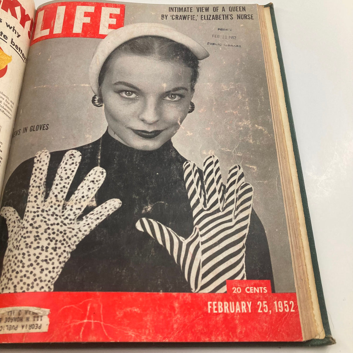 Cover of VTG 1952 Bound Life Magazine featuring a model showcasing gloves, dated February 25, 1952, with focus on fashion and vintage aesthetics.