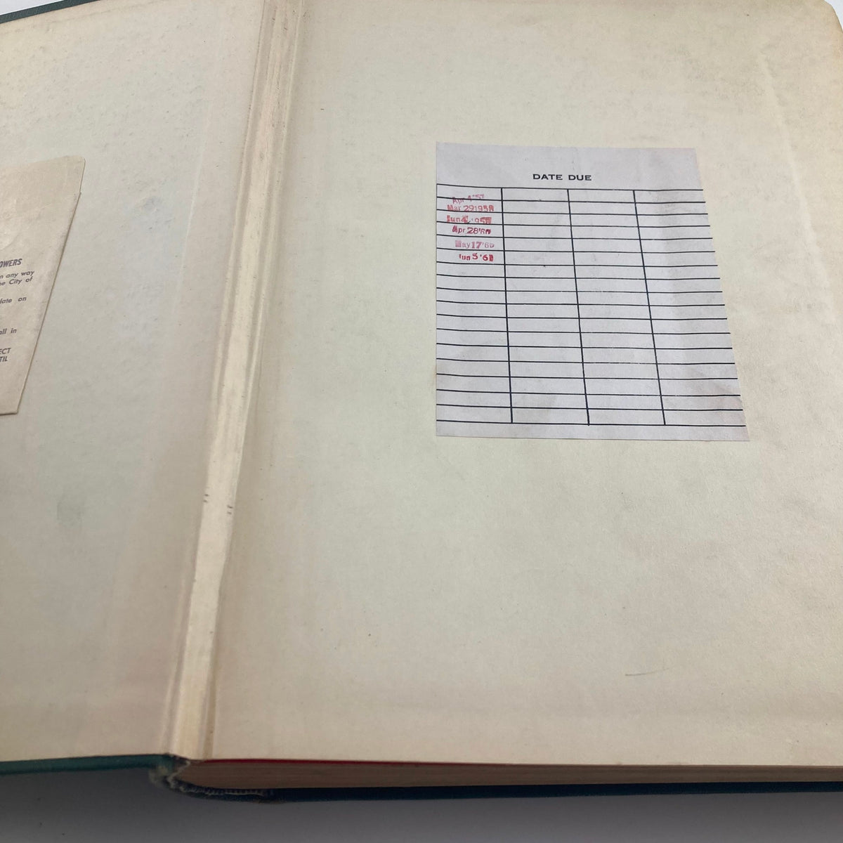 Inside cover of the Vintage 1952 Bound Life Magazine, displaying a library due date slip, adding to its collectible charm.