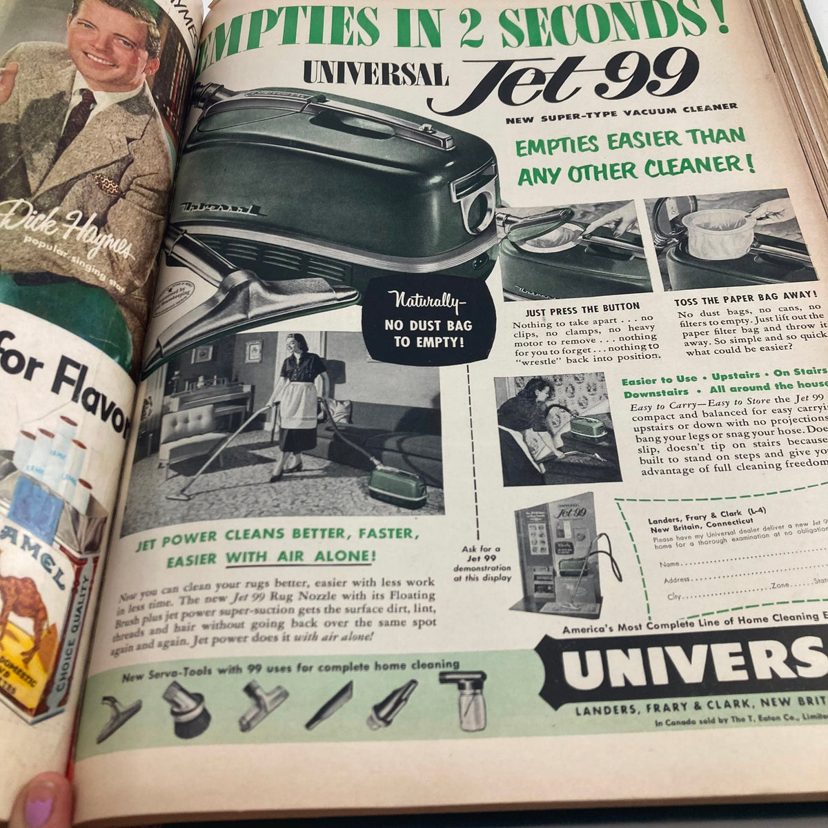 Interior page advertisement from the Vintage 1952 Bound Life Magazine, promoting the Universal Jet 99 vacuum cleaner, illustrating mid-century design.