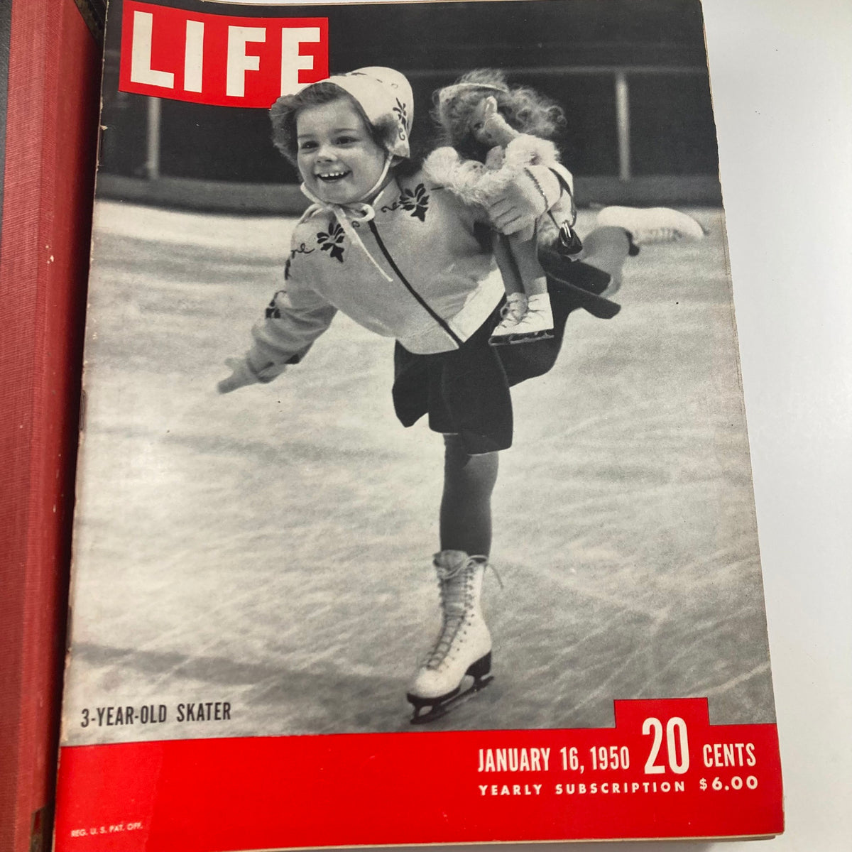 Cover of January 16, 1950, issue of LIFE magazine showcasing a 3-year-old skater with her doll, reflecting childhood and innocence in vintage photography.