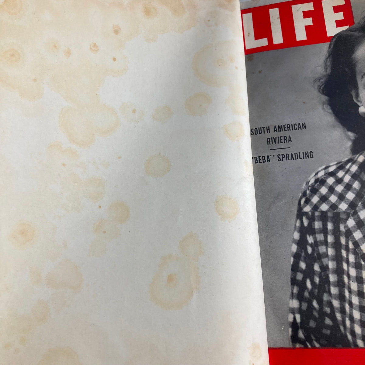 Interior view of VTG 1951 Bound Life Magazine, showcasing age-related wear with spots on the pages.