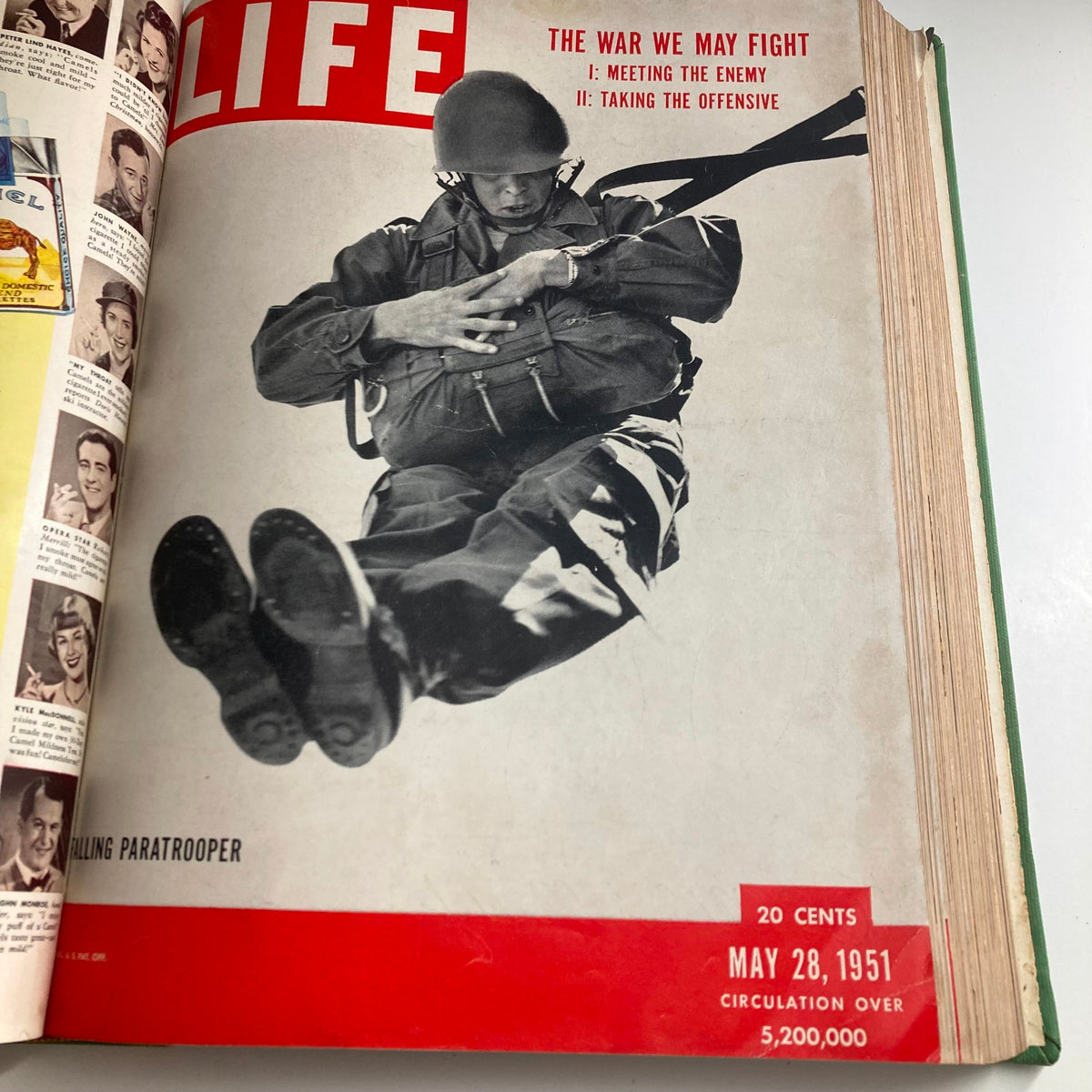 Cover of VTG 1951 Bound Life Magazine from May 28, depicting a paratrooper in action, emphasizing military themes.