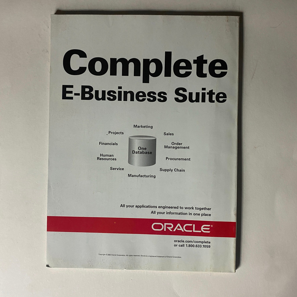 Oracle advertisement for the Complete E-Business Suite in Fortune Magazine, April 28, 2003, detailing various business solutions including marketing, finance, and supply chain management.