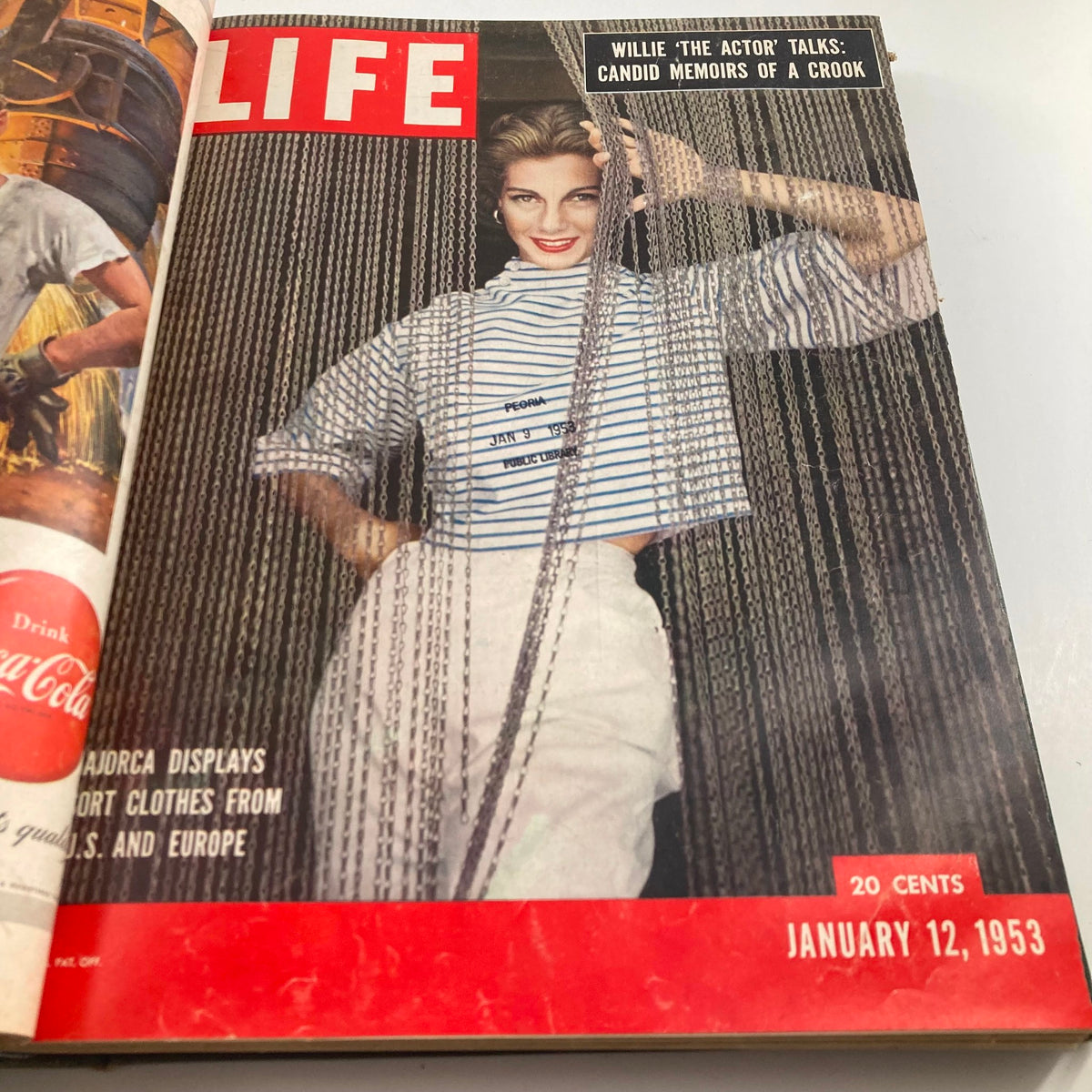 January 12, 1953 edition of the VTG 1953 Bound Life Magazine, showcasing a fashionable model against a chain backdrop, highlighting 1950s trends.
