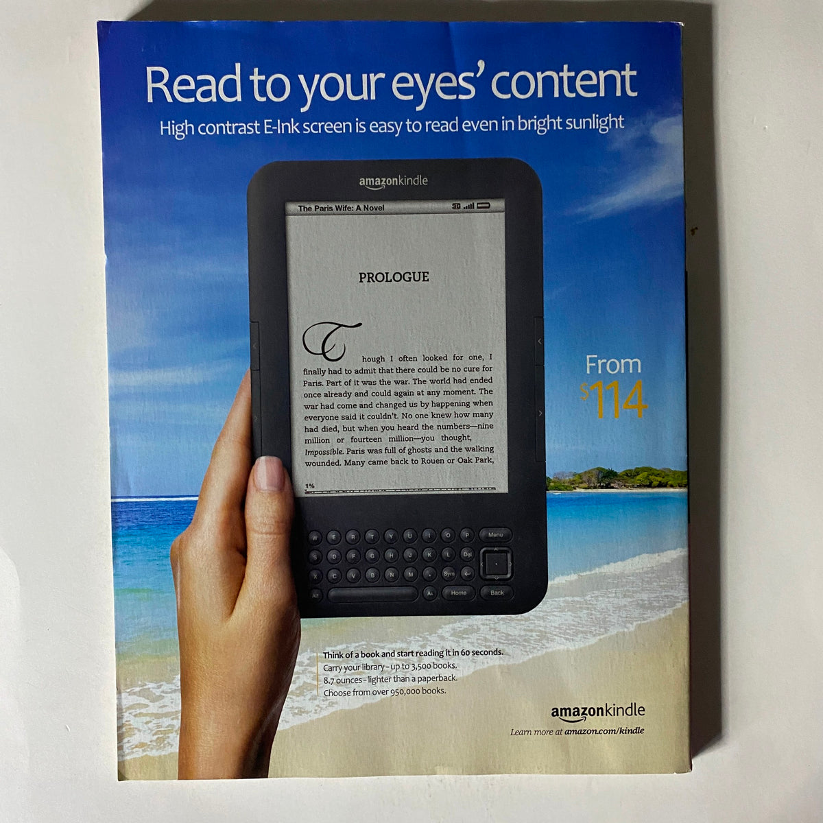 Back cover of Fortune Magazine July 25, 2011, showcasing an advertisement for Amazon Kindle, highlighting its high contrast E-Ink screen suitable for reading in sunlight.