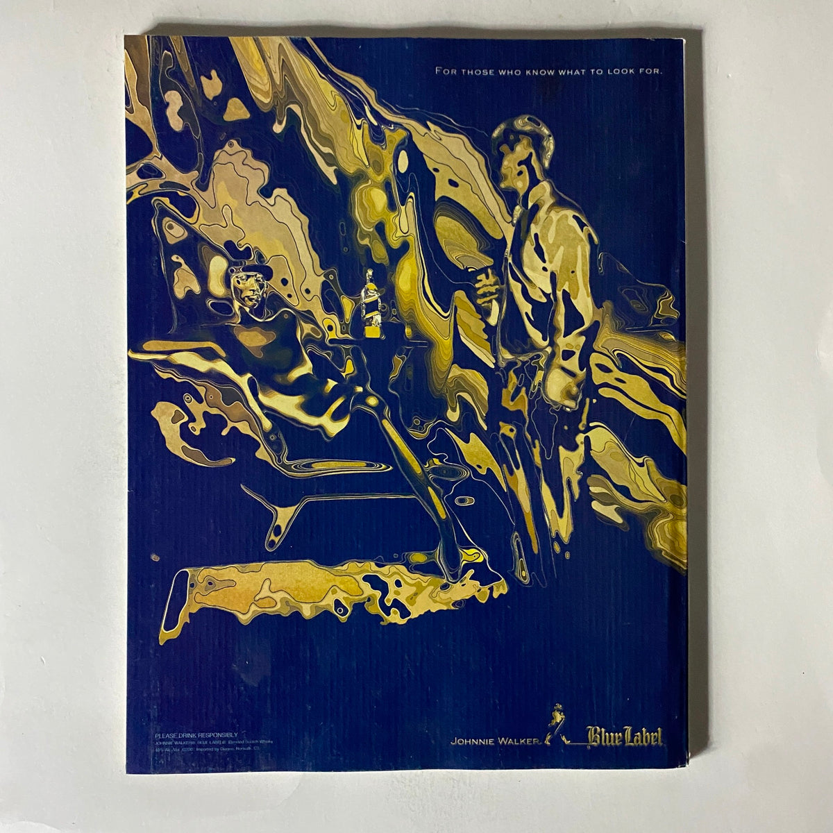 Vintage advertisement for Johnnie Walker Blue Label, featured on the back cover of Fortune Magazine March 5, 2007, capturing an artistic interpretation of sophistication and luxury.