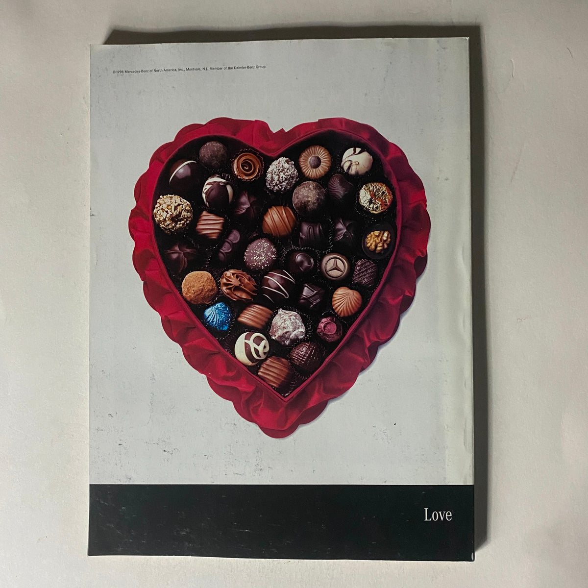 Fortune Magazine February 16, 1998 cover featuring a heart-shaped box of assorted chocolates, symbolizing love, with a focus on the article 'Cable Cowboy John Malone Rides Again'.