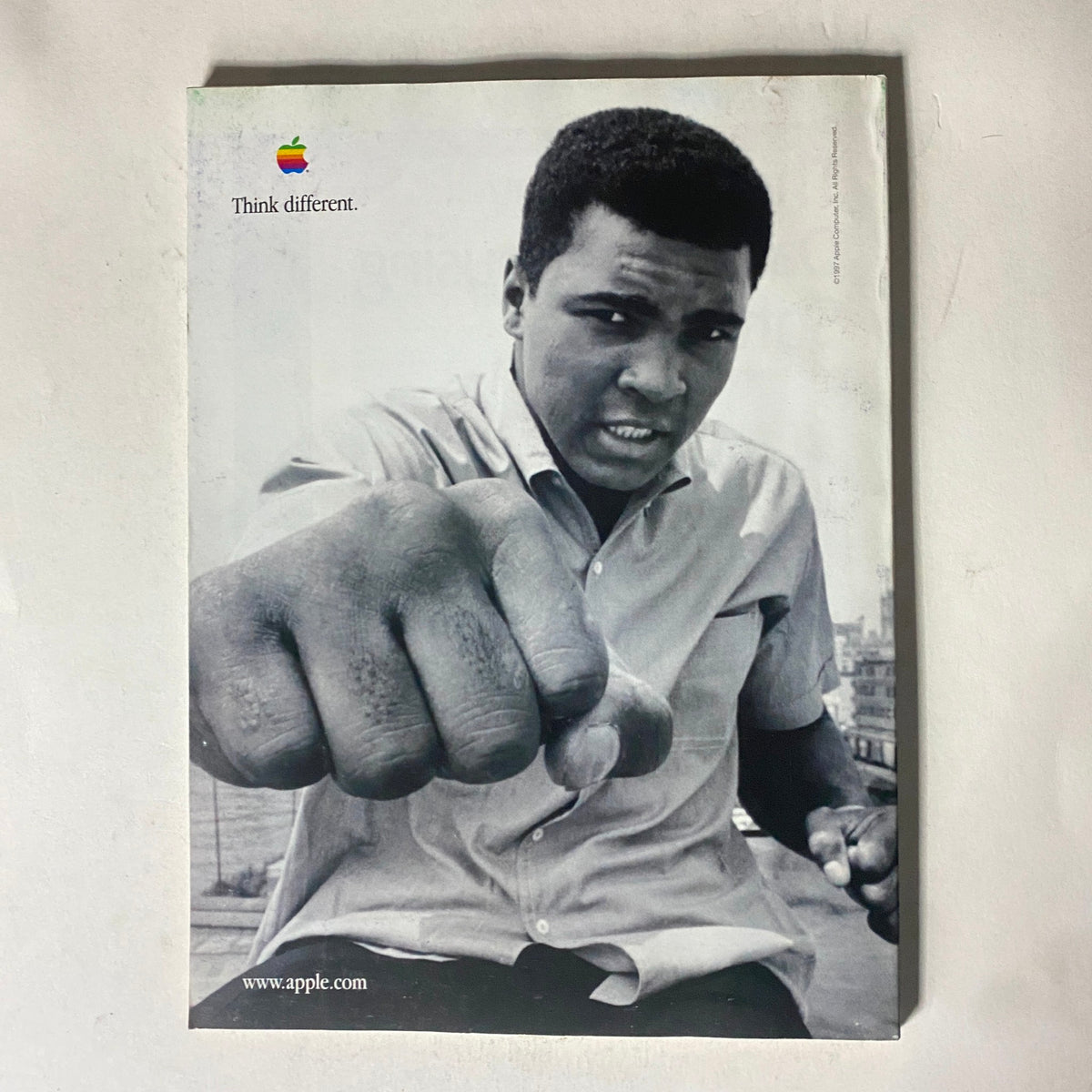 Fortune Magazine January 12, 1998 cover featuring an iconic black-and-white photograph of a man resembling Muhammad Ali with a fist raised, promoting Apple's 'Think Different' campaign, showcasing the theme of the 100 Best Companies To Work For.