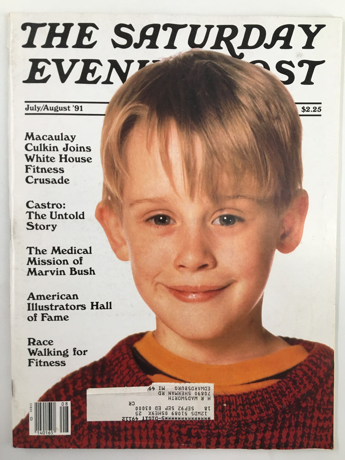 The Saturday Evening Post July 1991 cover featuring Macaulay Culkin, showcasing his youthful charm as the cover star with headlines about Fidel Castro and White House fitness initiatives.