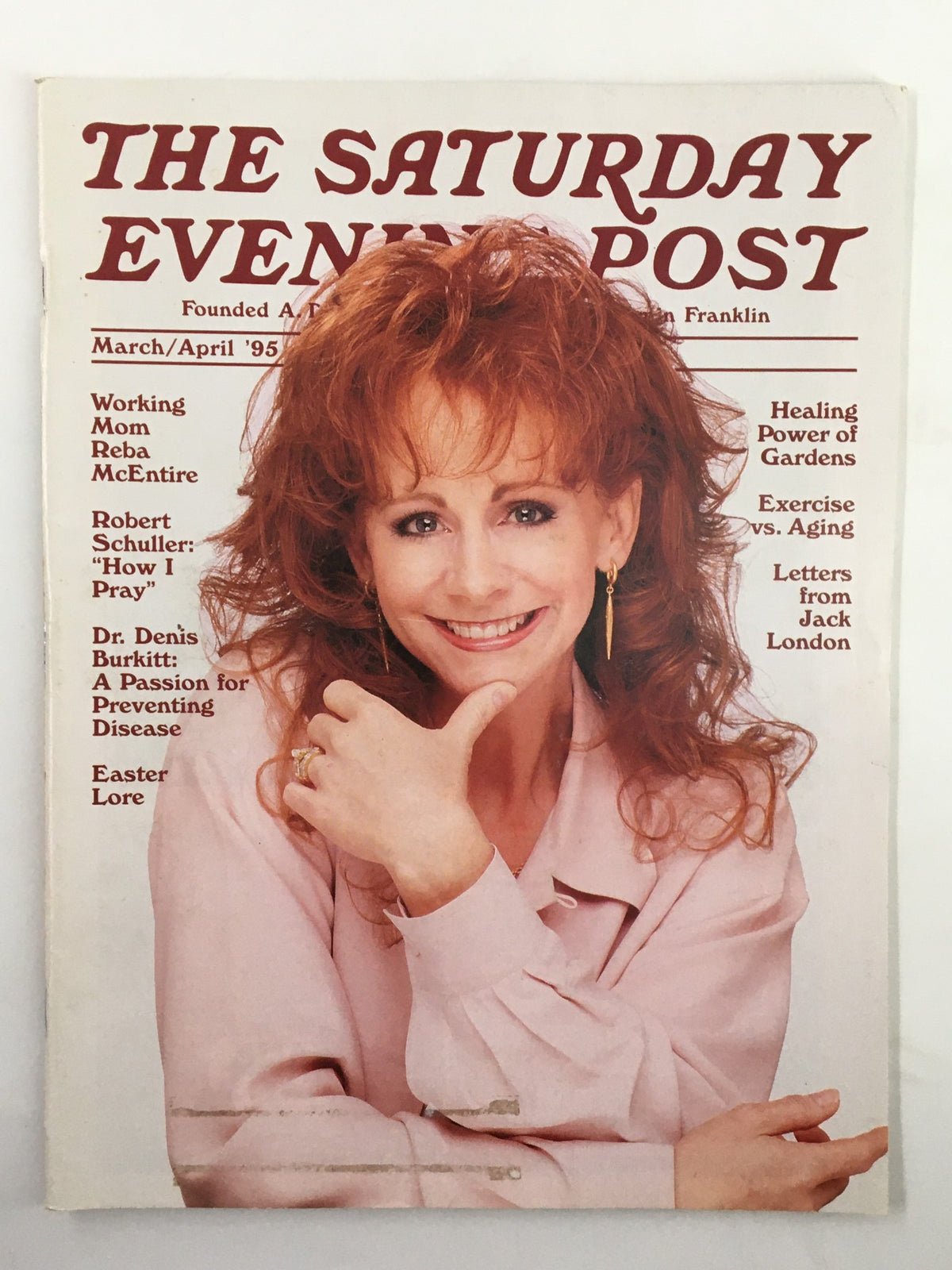 Cover of The Saturday Evening Post March 1995 featuring country music star Reba McEntire, with a smiling portrait and headlines about Robert Schuller and various articles.