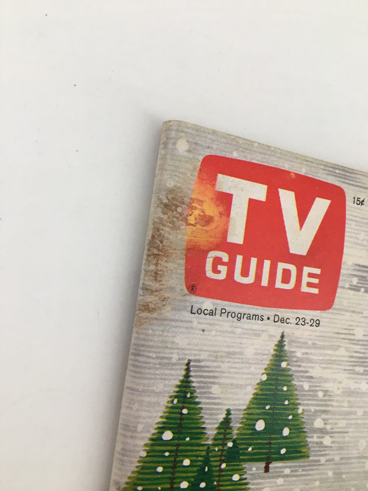 Cover of TV Guide Magazine December 23 1967 featuring festive pine trees, showcasing the vintage logo and publication details.