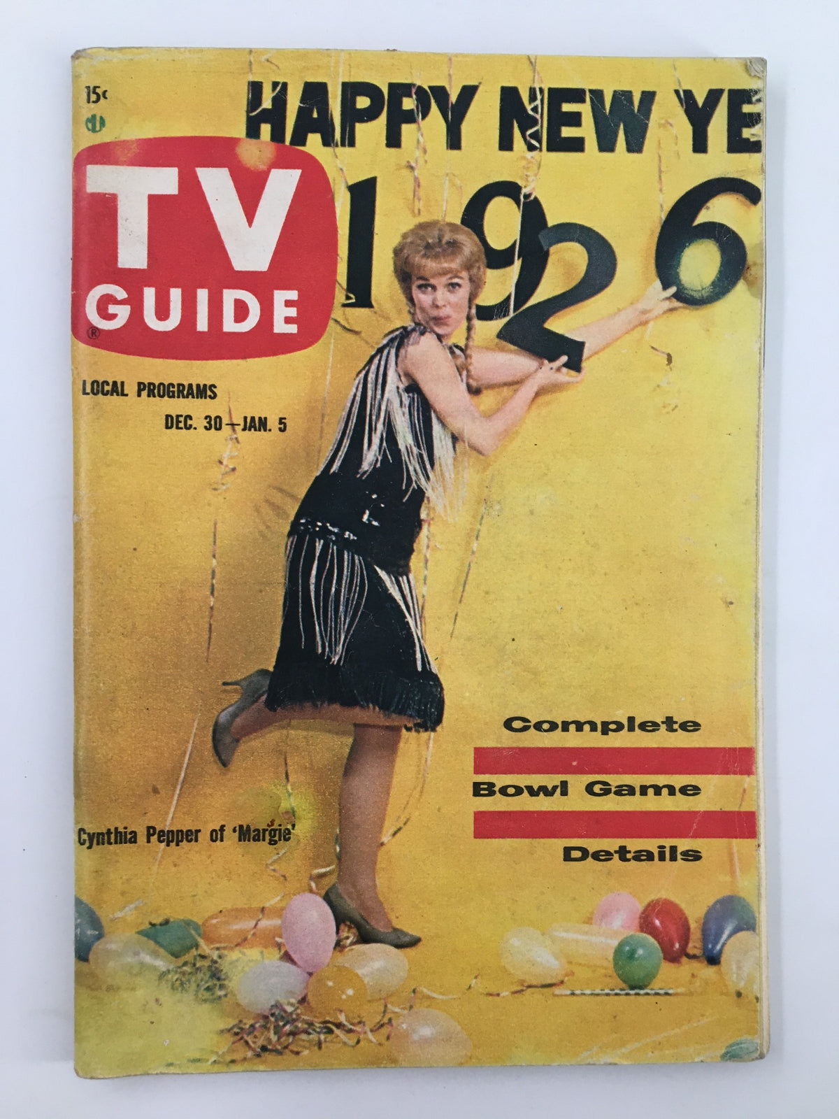 Cover of TV Guide Magazine December 30 1961 featuring actress Cynthia Pepper in a festive outfit, celebrating New Year's with colorful balloons and large numbers.