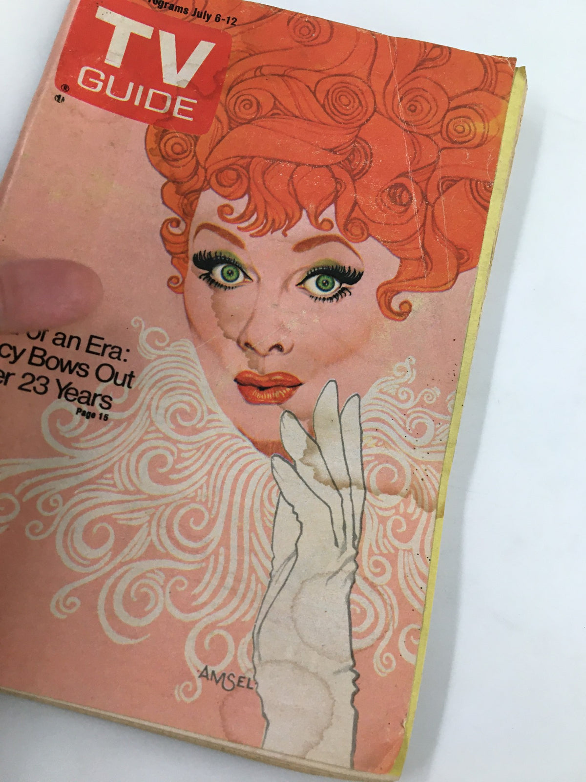 Close-up of the TV Guide Magazine cover from July 6, 1974 showcasing Lucille Ball with striking red curls and bold green eyes, illustrating the magazine's nostalgic appeal in television history.