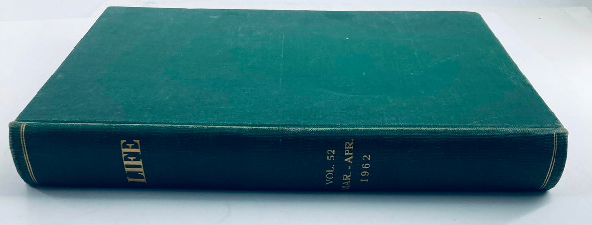 Side view of the hardcover edition of vintage 1962 Bound Life Magazine March - April displaying the title 'LIFE' and publication dates.