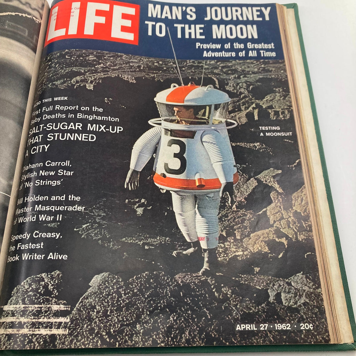 Cover image of Vintage 1962 Life Magazine April 27 showcasing a man in a moonsuit, titled 'Man's Journey to the Moon', illustrating space exploration themes.
